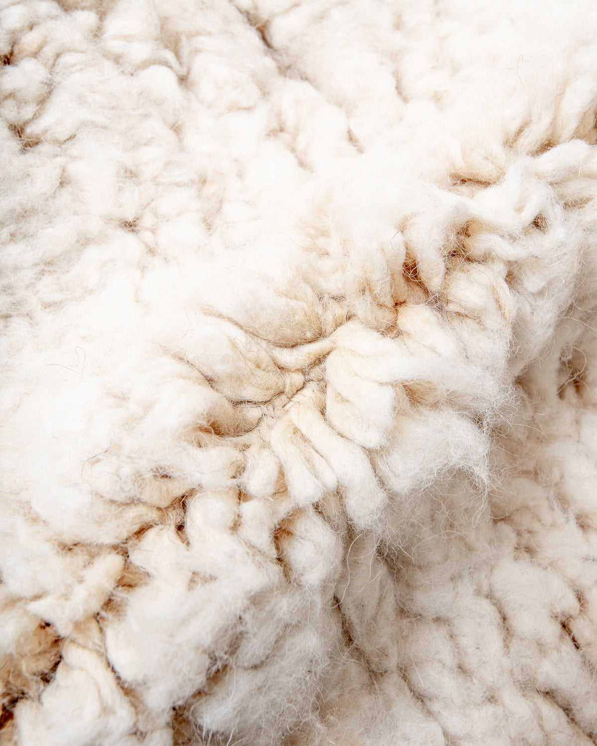 Modern, designer, handcrafted Berber rug from Morocco. Beniourain carpet with minimalist design, natural wool pile and a fluffy texture.